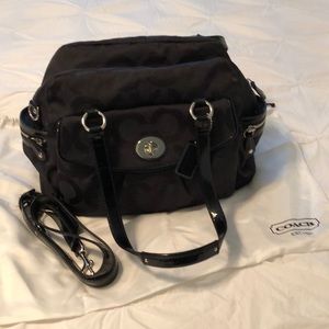 Coach diaper bag with blue silk lining
